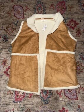 Maurices women’s Suede-Look Sherpa Vest in Tan and White